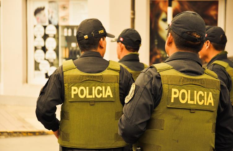 Police officers seen from behind